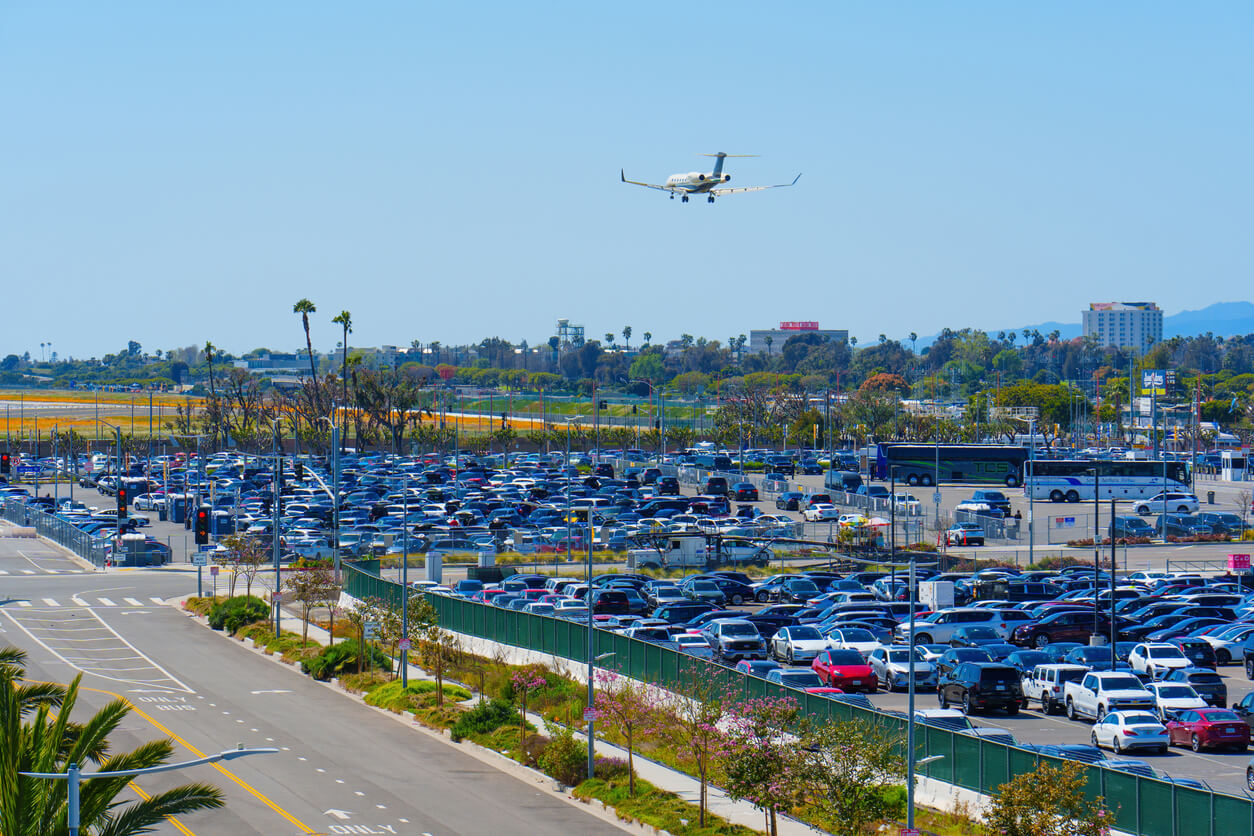 LAX Budget Parking Lot and Approaching Airplane.